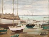 many boats that are sitting on the beach