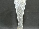 a glass vase that is sitting on a table