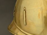 a close up of a helmet on a table