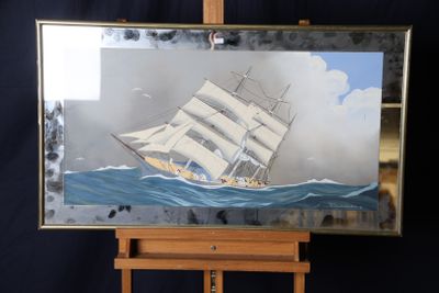 une photo d'un tableau représentant un bateau posé sur un chevalet