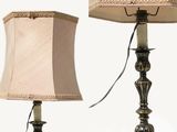two lamps that are next to each other on a table