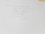 a close up of a piece of paper with handwriting on it