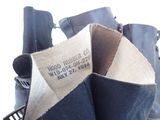 a close up of a pair of boots with a label on them