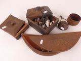 a small wooden box with a lot of items inside of it
