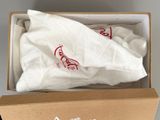 a box with a white cloth inside of it