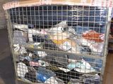 a metal cart with a lot of trash inside of it