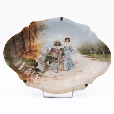 a plate with a picture of two women on it