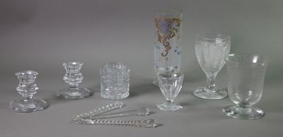 a lot of glass items that are sitting on a table
