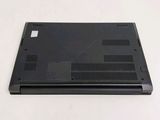 an open laptop computer sitting on top of a white table