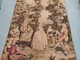 a rug that has a picture of a woman and children on it