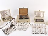 many different types of spoons and spoons in a box