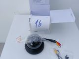 a white table with a black object on top of it