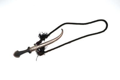 an image of a knife with a black handle