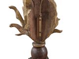 a lamp that is sitting on top of a wooden stand