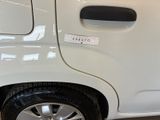 a close up of a car door handle with a sticker on it