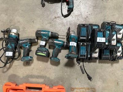 a lot of tools that are sitting on the floor