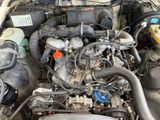 a picture of a car engine with its hood open