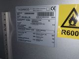 a picture of a caution sign on the side of a machine