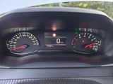 a close up of a car dashboard with a speedometer and gauges