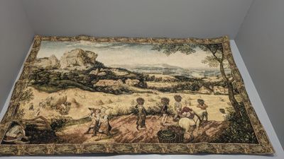 an image of a tapestry with a picture of a man on a horse