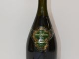 an image of a bottle of champagne sitting on a table