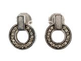 a pair of silver earrings with crystals on a white background