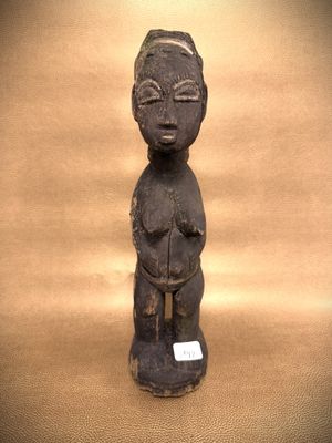 statue of a woman holding a baby in her arms