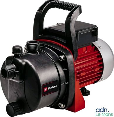 an image of a red and black pump sitting on top of a white surface