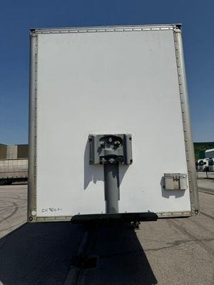 an image of a white box truck parked in a parking lot