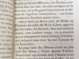 an open book with a black and white picture on it
