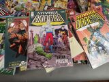a lot of comic books sitting on a table