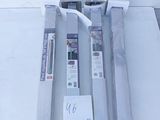 three different types of electronic equipment on a white surface