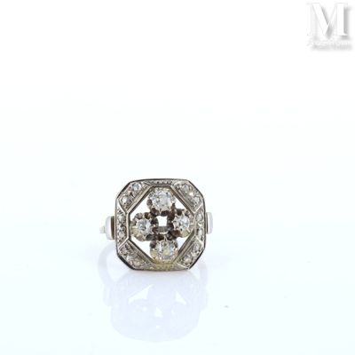 an image of a diamond ring on a white surface