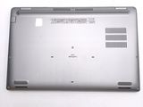 a laptop that is sitting on a white surface