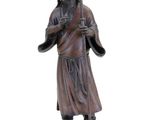 a statue of a woman holding a baby in her arms