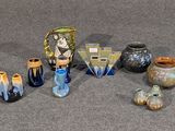 beaucoup de vases posés par terre