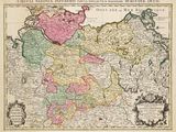 une vieille carte de la Belgique avec ses frontières en rose, vert et jaune