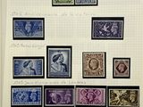 an image of a picture of a collection of stamps on a wall