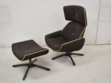 an image of a chair and ottoman in a room