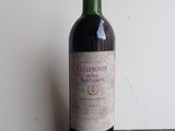 a bottle of wine that is sitting on a table