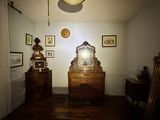 an image of a room with a mirror and a dresser