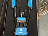 a blue tool in the box on the floor
