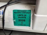 a label on the side of a machine that is not working