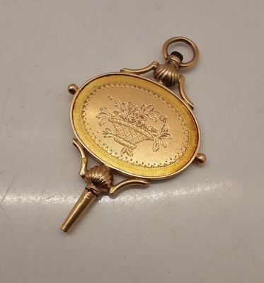 l'image d'une pièce d'or avec une clé sur un fond blanc