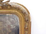 a picture of a gold frame with a bird on it