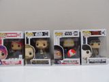 three funko pop vinyl figures are lined up in a row