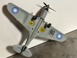 un avion miniature posé par terre