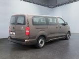a brown van that is parked in a room