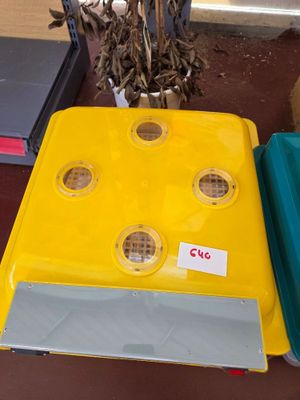 a table with a bunch of plastic containers on it