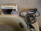 a blow dryer sitting on top of a bath tub